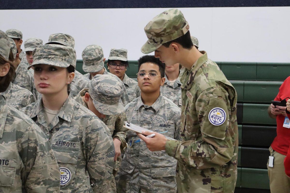 Cadet Teegan Scharp conducts daily inspection for his flight. 