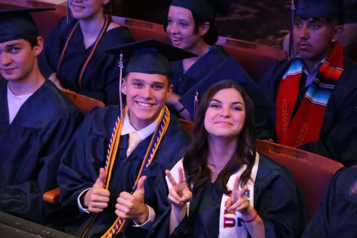 Cadets Hunter Bricco and Anessa Brady share their joy for graduation last year. 